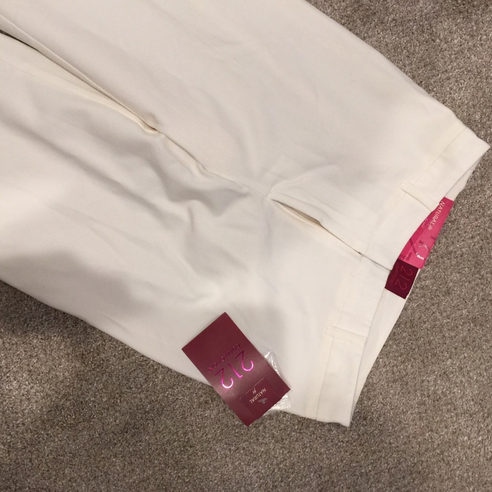 Ivory long dress pants with a lining.